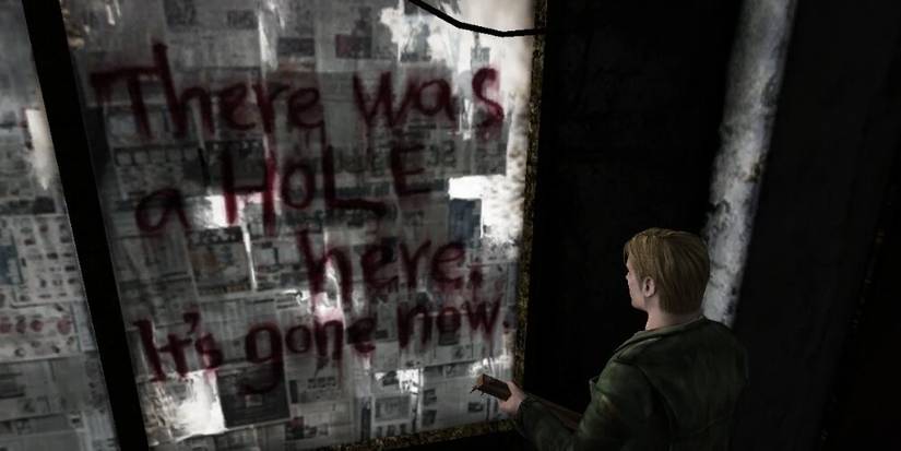 James looking at creepy writing on a wall 
