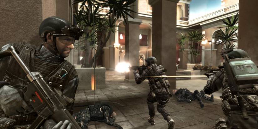 Multiple soldiers firing in a gunfight 