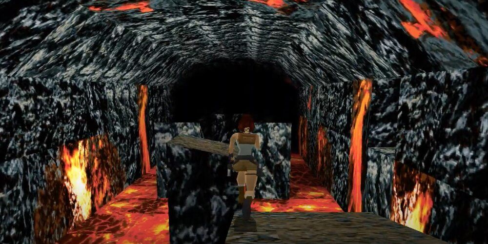 Lara running through a lava cave 