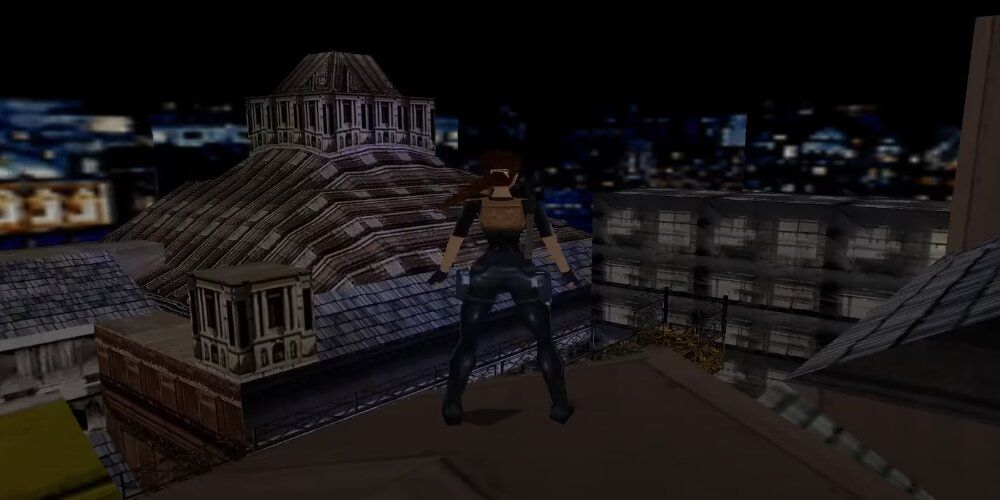 Lara standing on a rooftop looking across London 