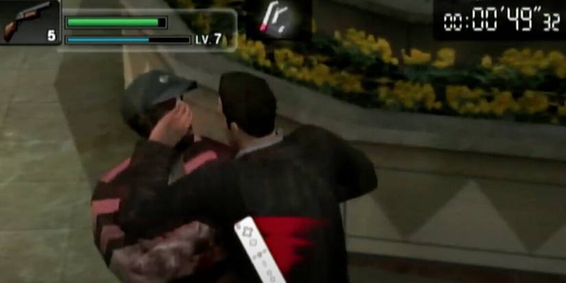 Frank pushing off a zombie 