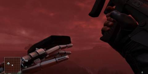 Player balancing a magazine on his hand in Far Cry 3