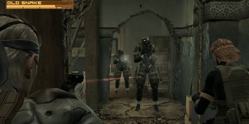 Snake and Meryl aiming at Frog soldiers 