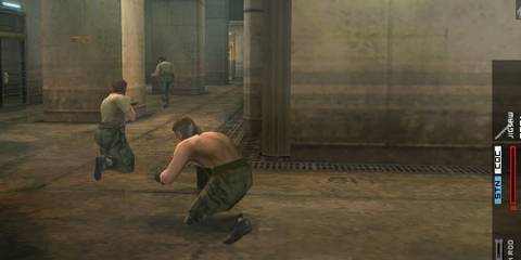 Big Boss sneaking behind two soldiers 