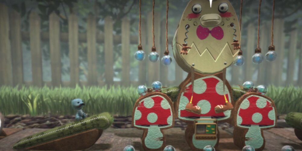 Sackboy running over some mushrooms with a giant egg character 