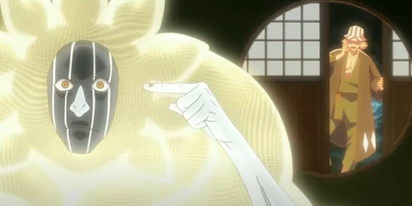 Mayuri with a surprised look on his face as Kisuke appears behind him 