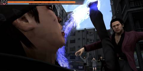 Akiyama lifting his leg for an attack against an enemy 