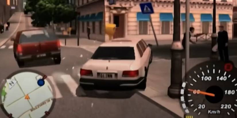 White car bashing through other cars and debris 