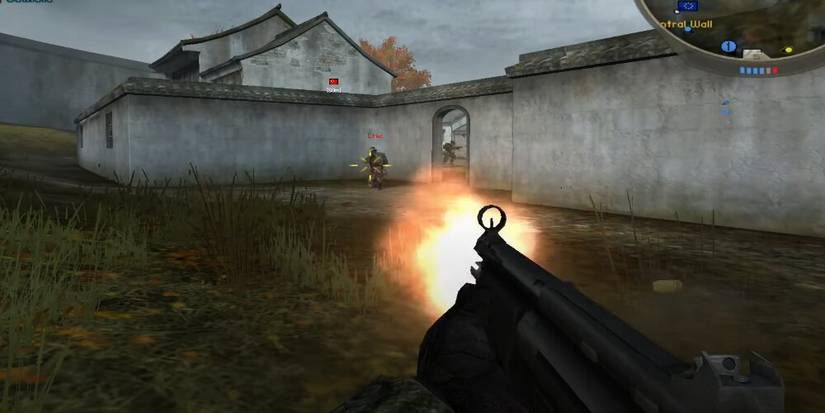 Player shooting at another player with an SMG 