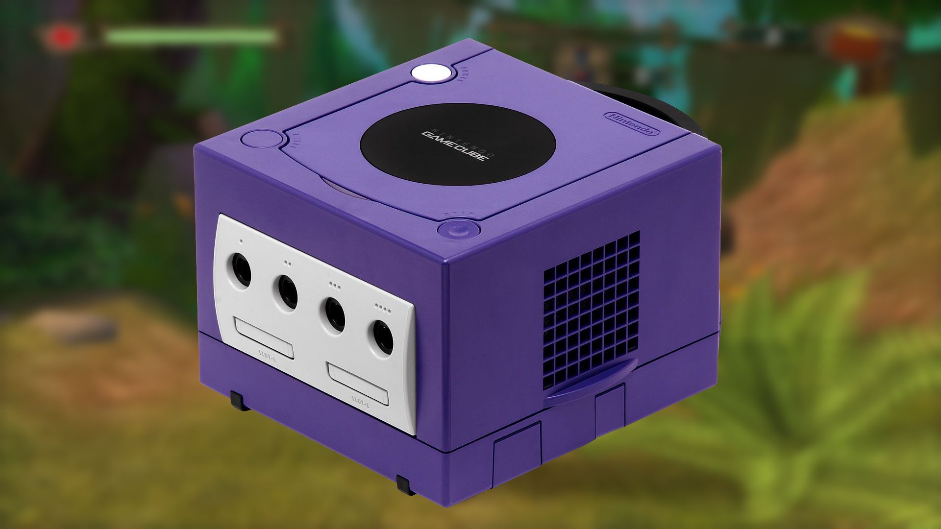 An image of a Nintendo GameCube set against a blurred screenshot from Shrek 2 on GameCube.