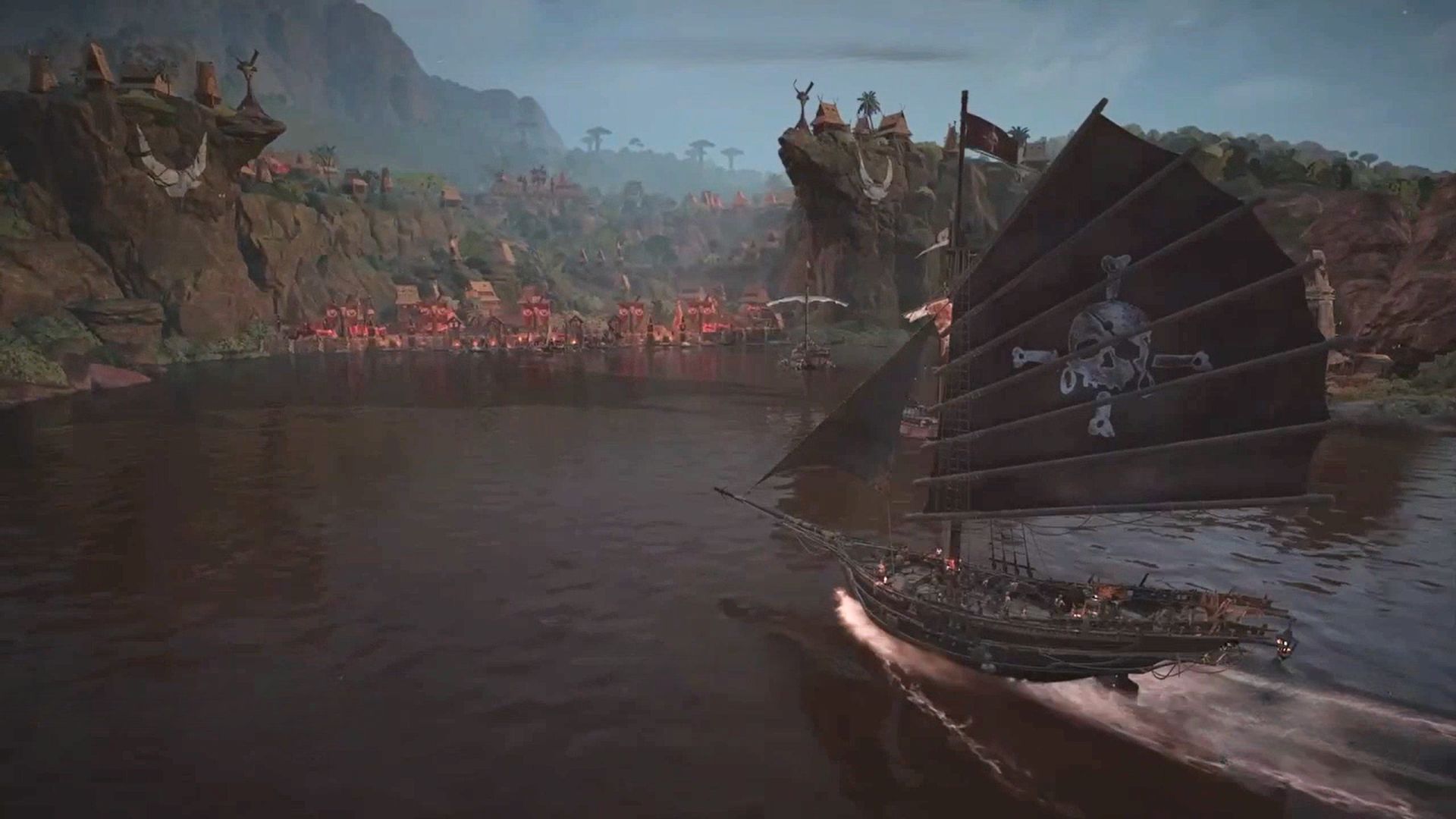 The settlement of Ankohonana in Skull and Bones with a player's ship