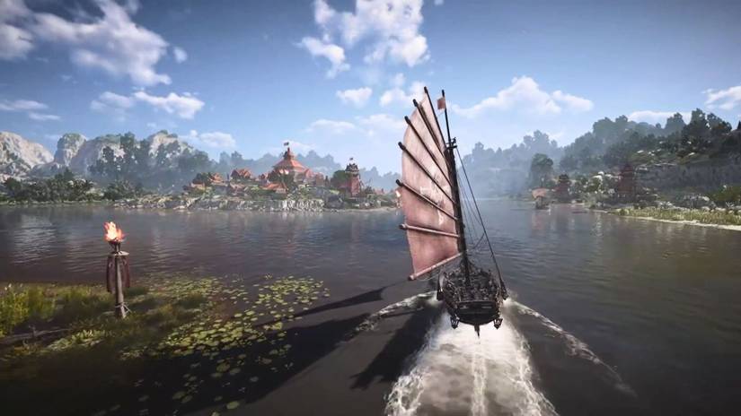 A player sailing their ship to the settlement of Suny in Skull and Bones