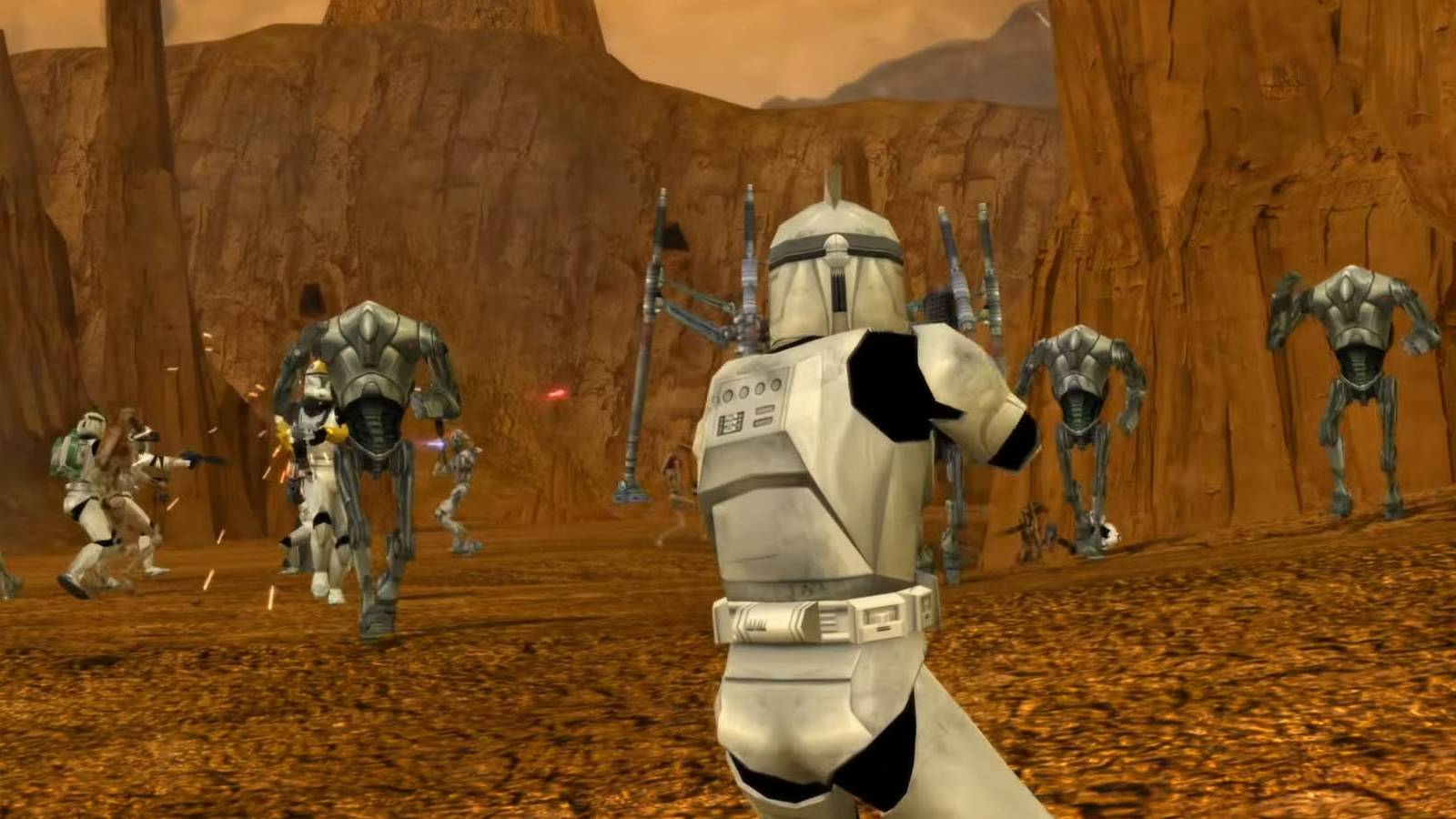 A screenshot of Clone Troopers and Battle Droids fighting on Geonosis in Star Wars Battlefront Classic Collection.