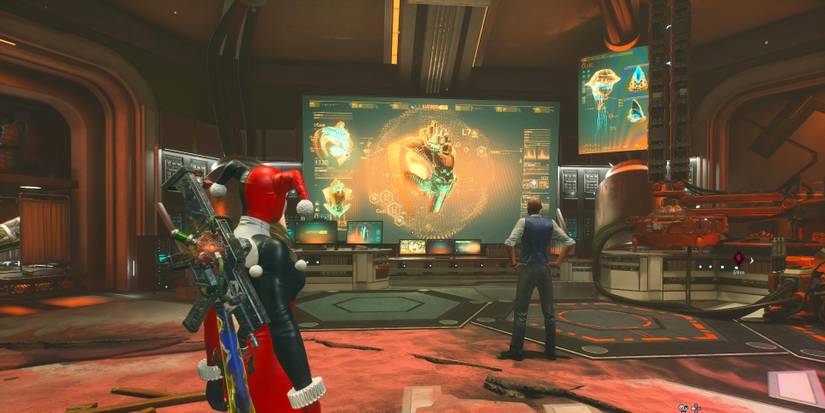 lex luthor looking at a monitor in his lab