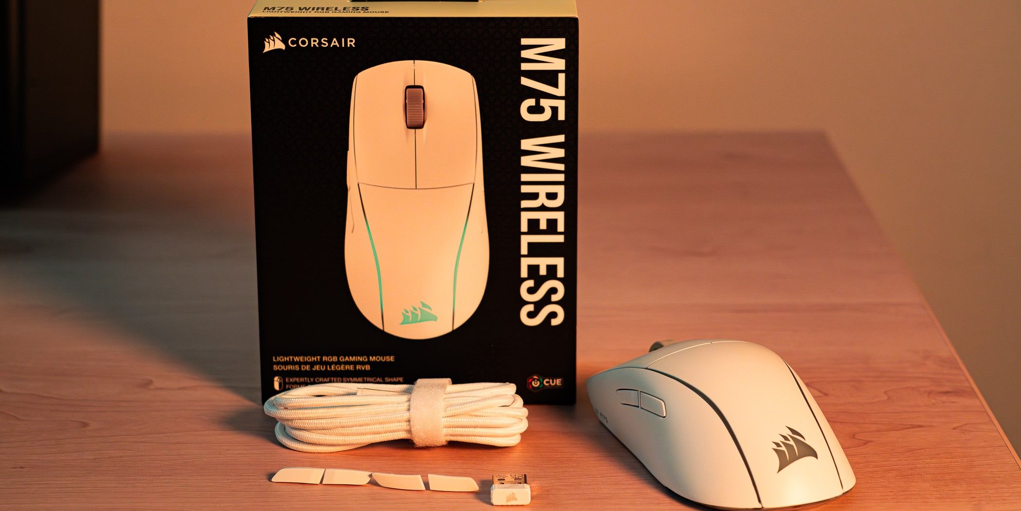 The Corsair M75 with cable, extra buttons and wireless receiver