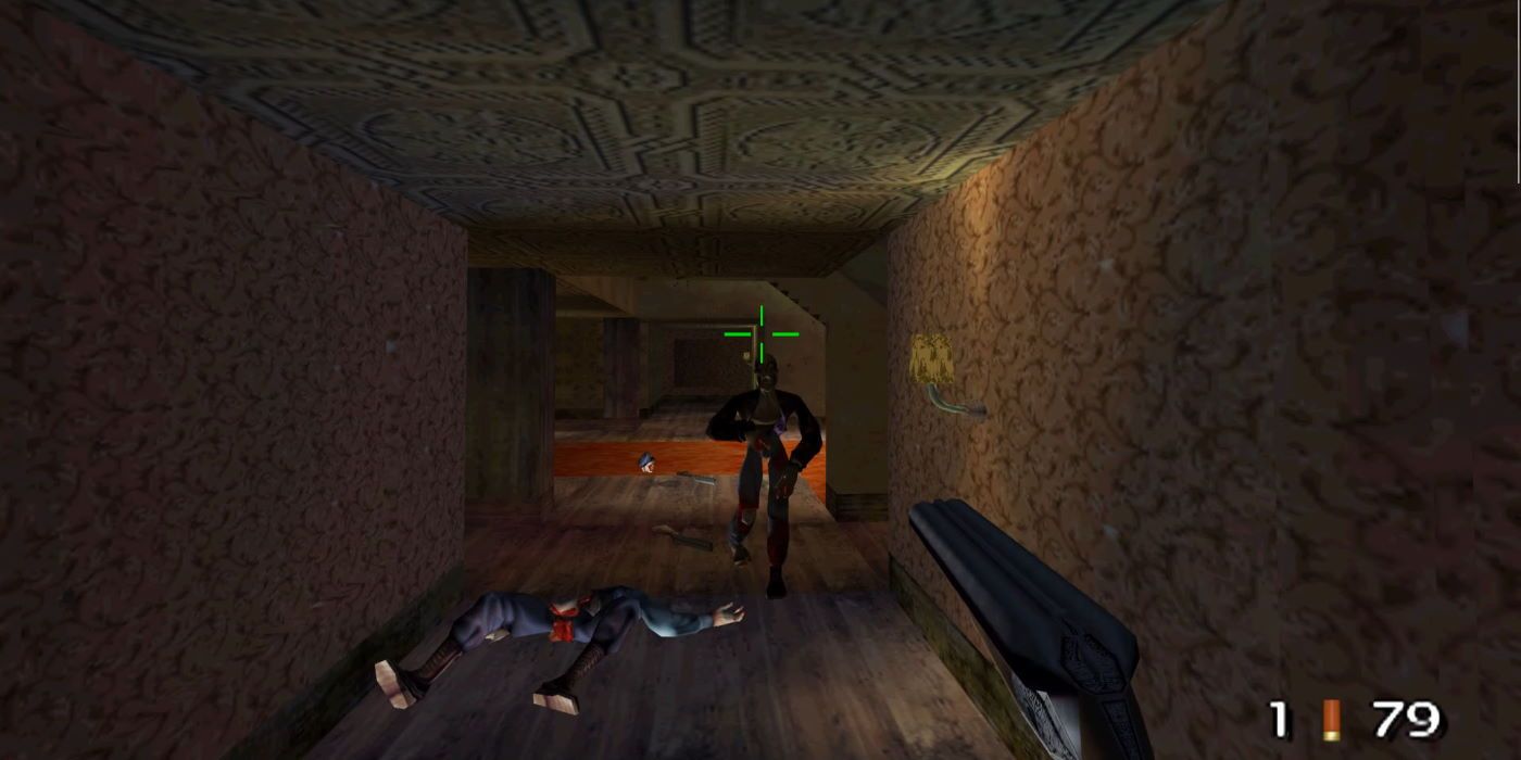 A shotgun aimed at a zombie next to a fallen one