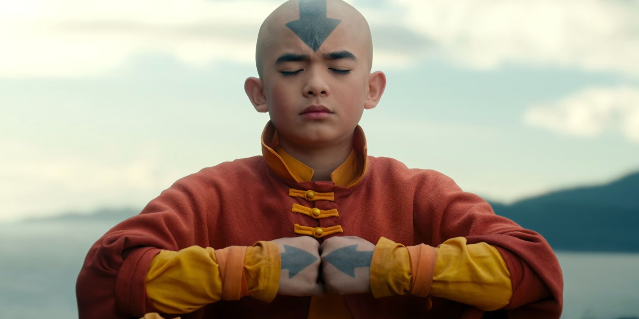 Aang meditating with his fists together