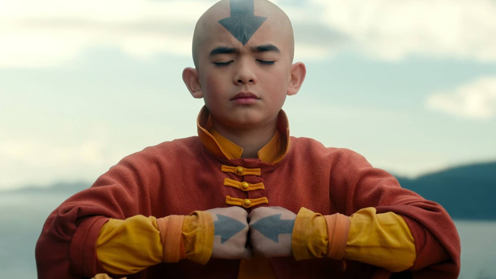 Aang meditating with his fists together