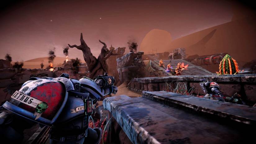 A Grey Knight Space Marine aiming his bolter at some infected foes