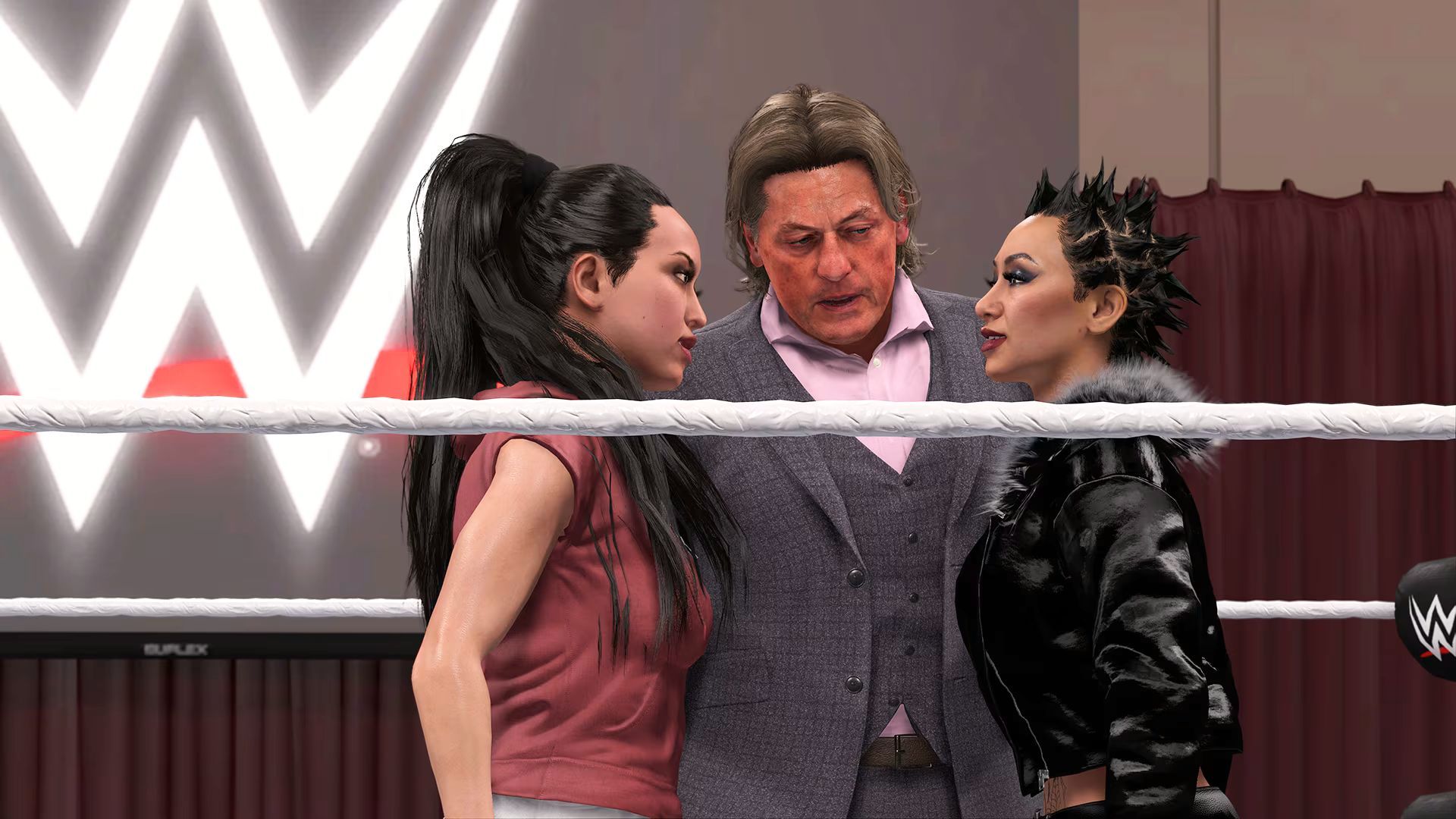 Shotzi and William Regal with a created character in WWE 2K24