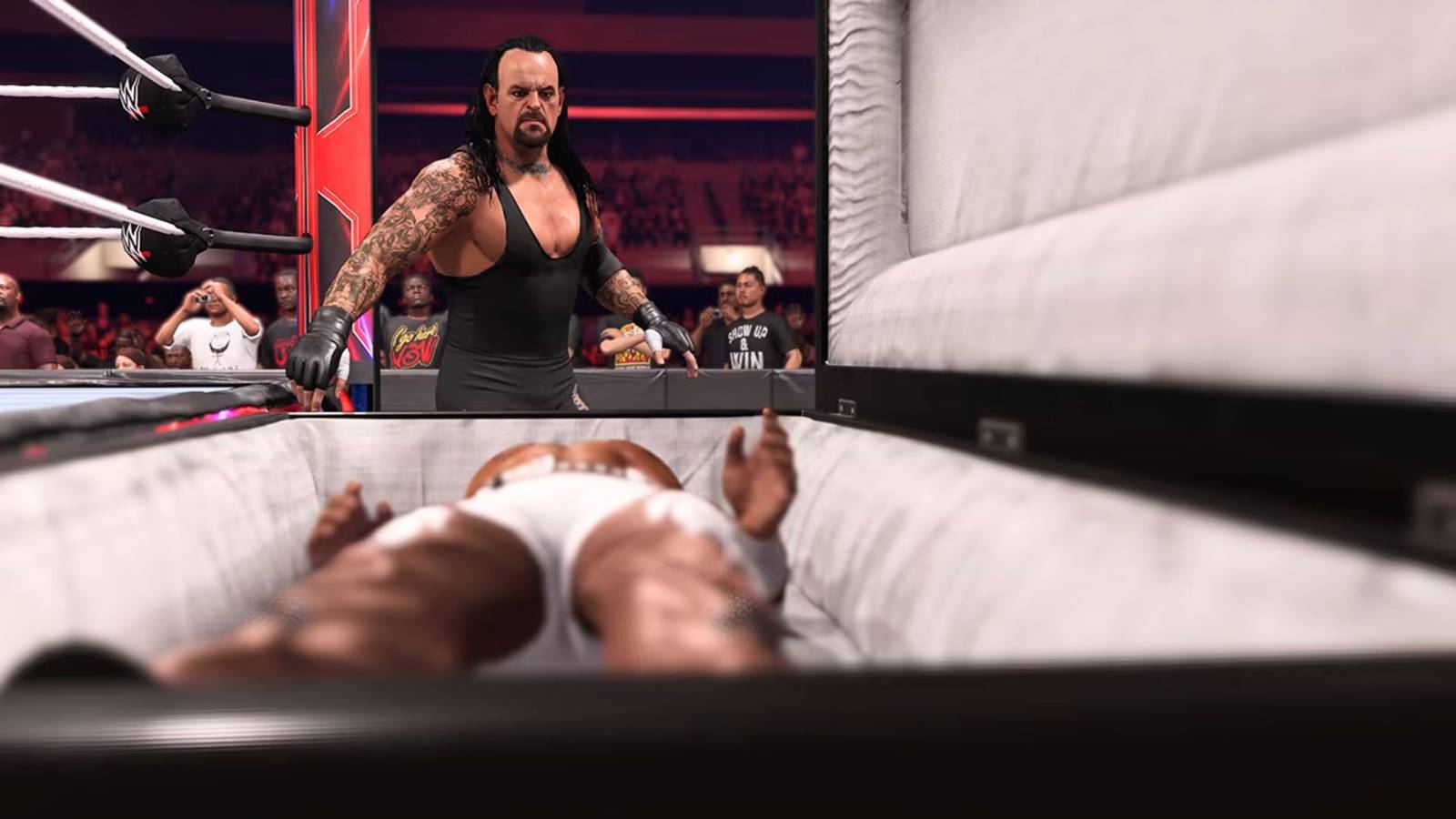 The Undertaker standing over Bobby Lashley in a casket in WWE 2K24