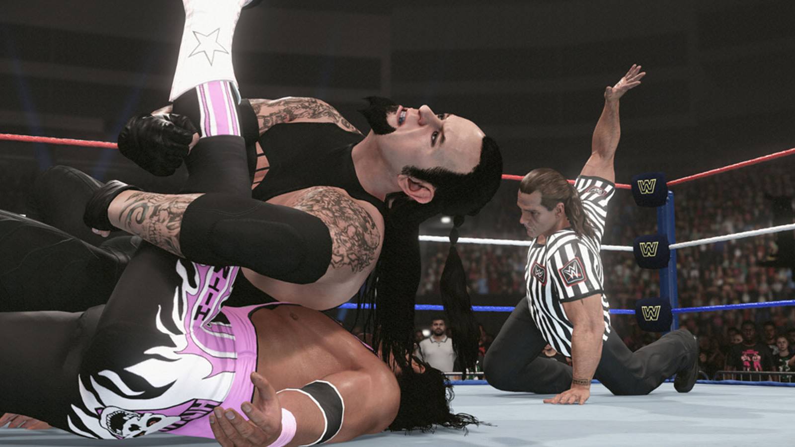 A screenshot of The Undertaker pinning Bret Hart while Shawn Micheals counts the pin in WWE 2K24.