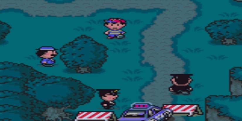 ness next to a police barricade in earthbound