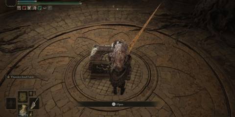 A chest in Crumbling Farum Azula in Elden Ring