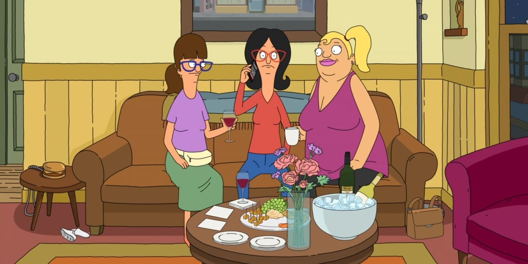 Gayle, Linda and Grechen sitting on the couch on Bob's Burgers