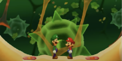 Mario and luigi facing each other in a level in bowser's inside story