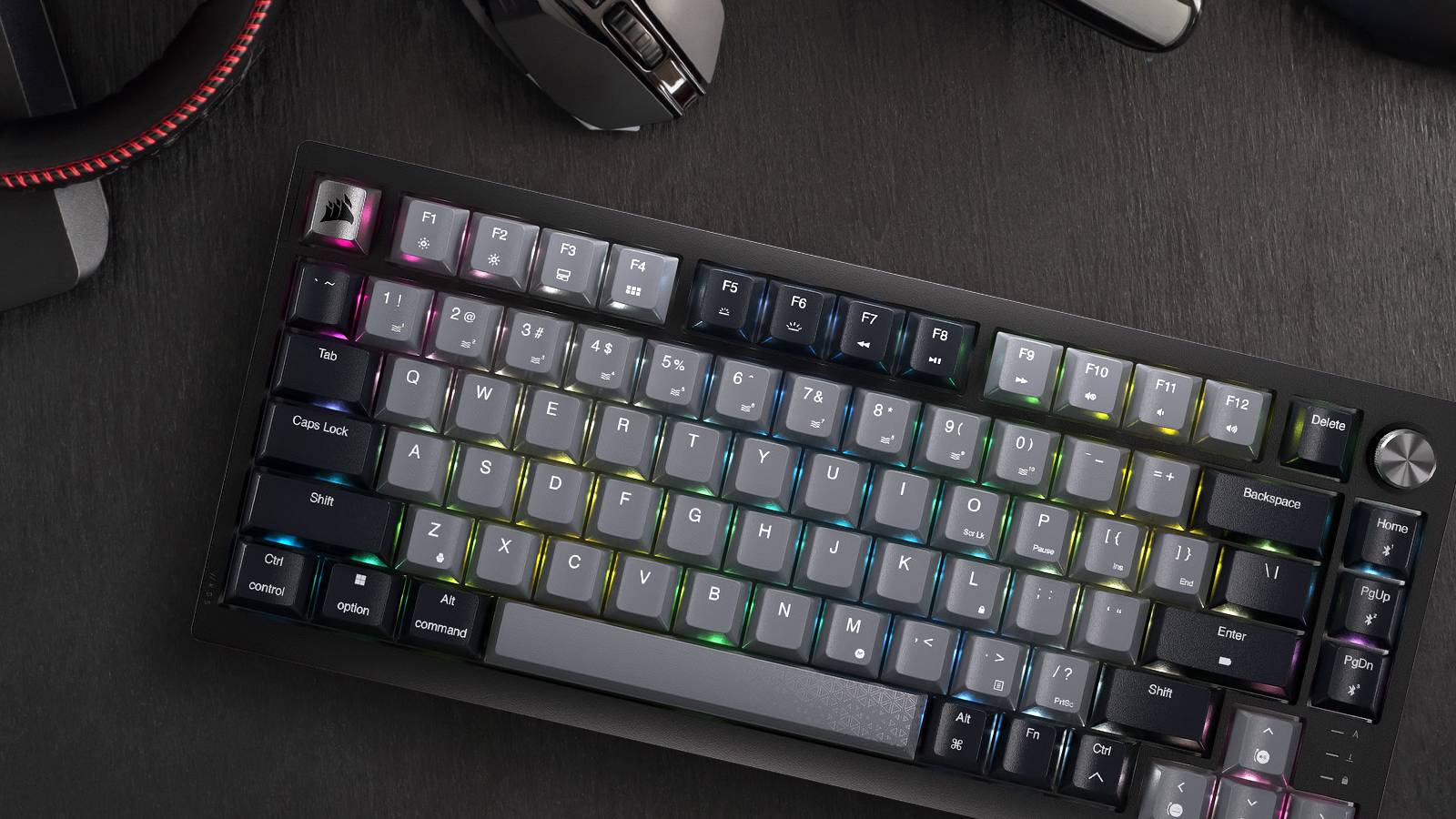 corsair k65 plus keyboard sitting on desk