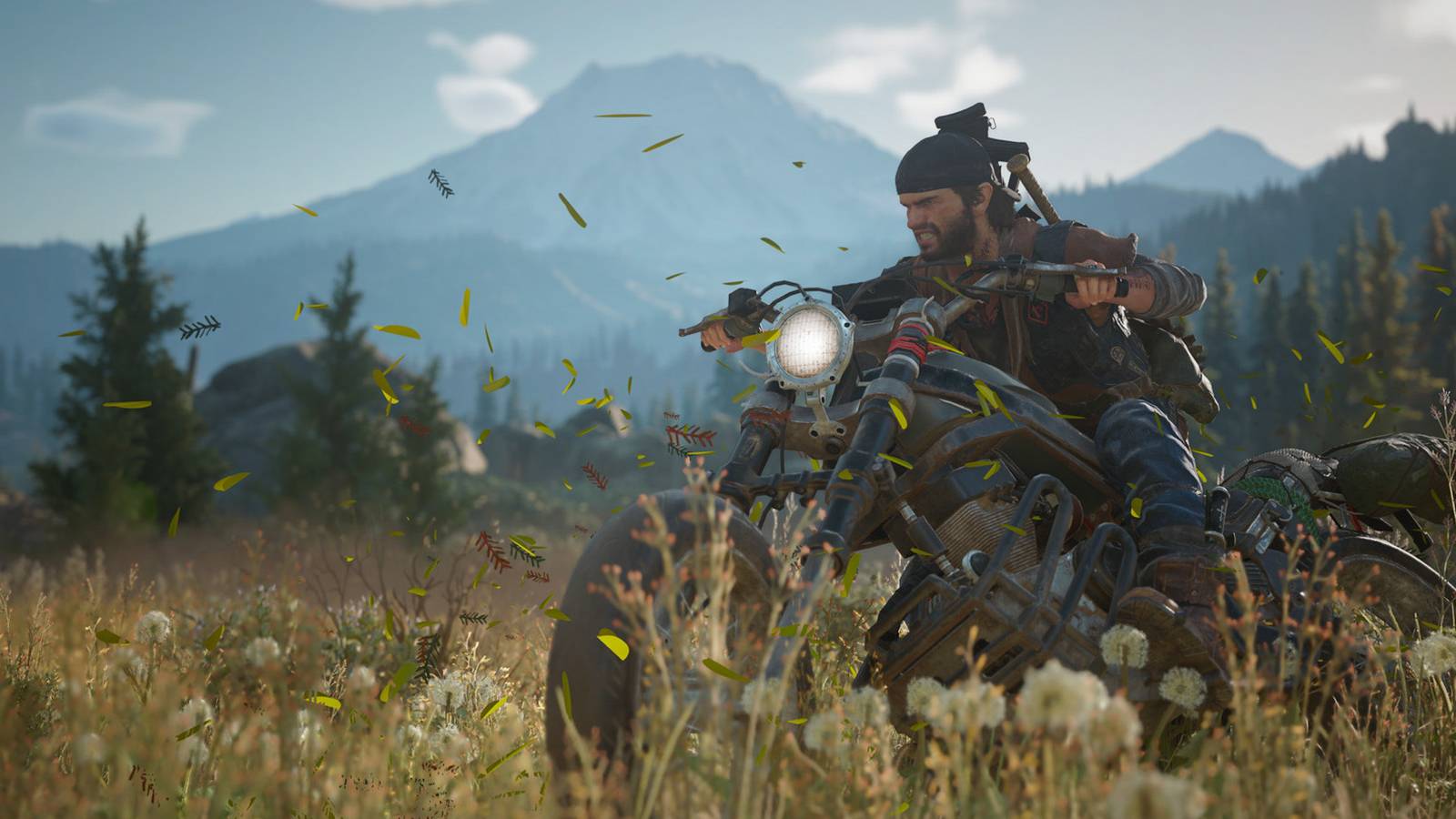 Days Gone cutscene screenshot Deacon St John driving bike thrugh dandelion field