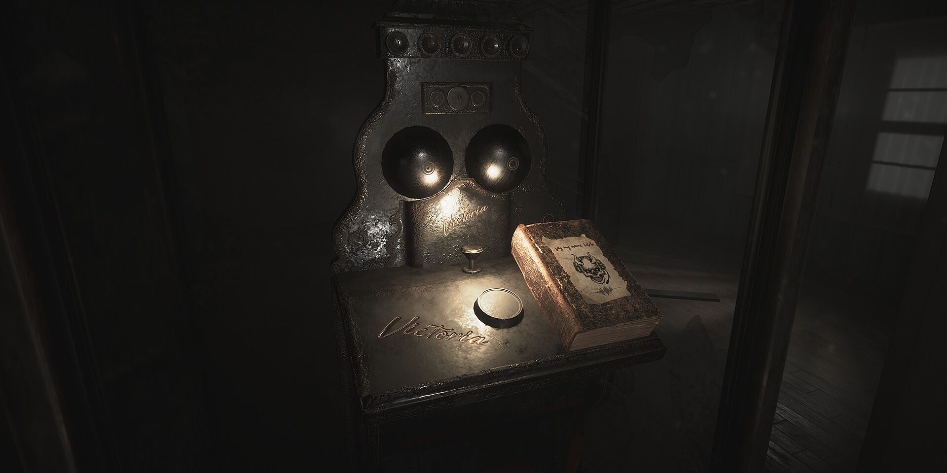 A book sitting next to a mechanism in Demonologist