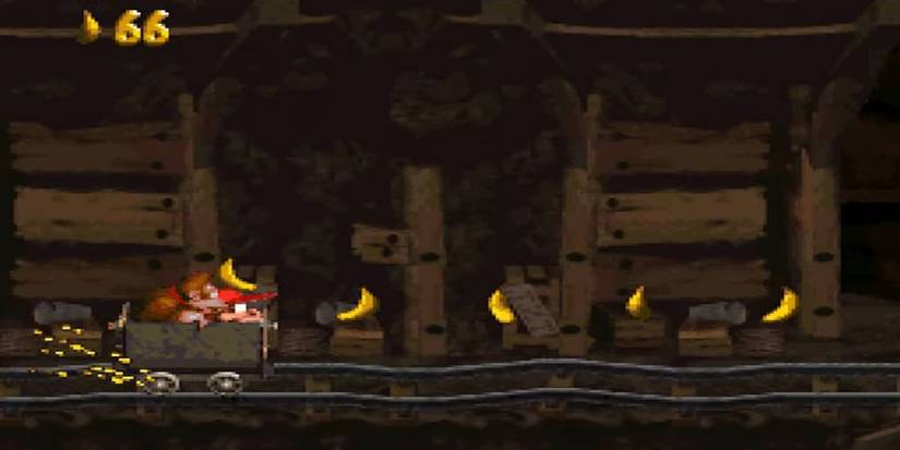 Donkey and Diddy going through the level Mine Cart Carnage.