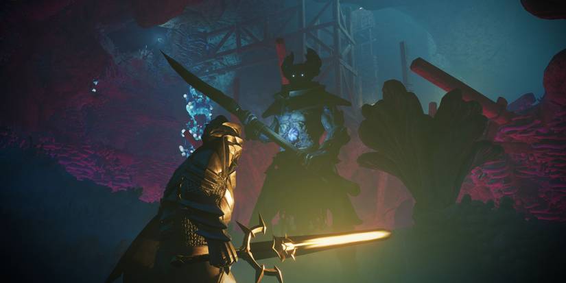 Fighting an armored enemy in the dark in Enshrouded