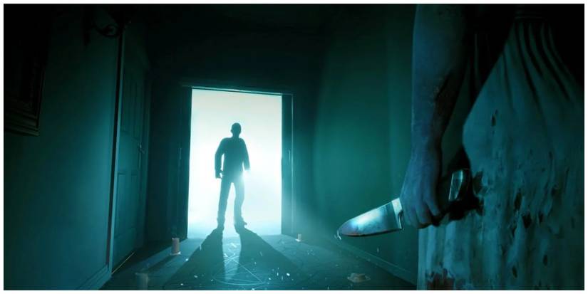 Characters facing each others over a ritualistic symbol, one holding a knife