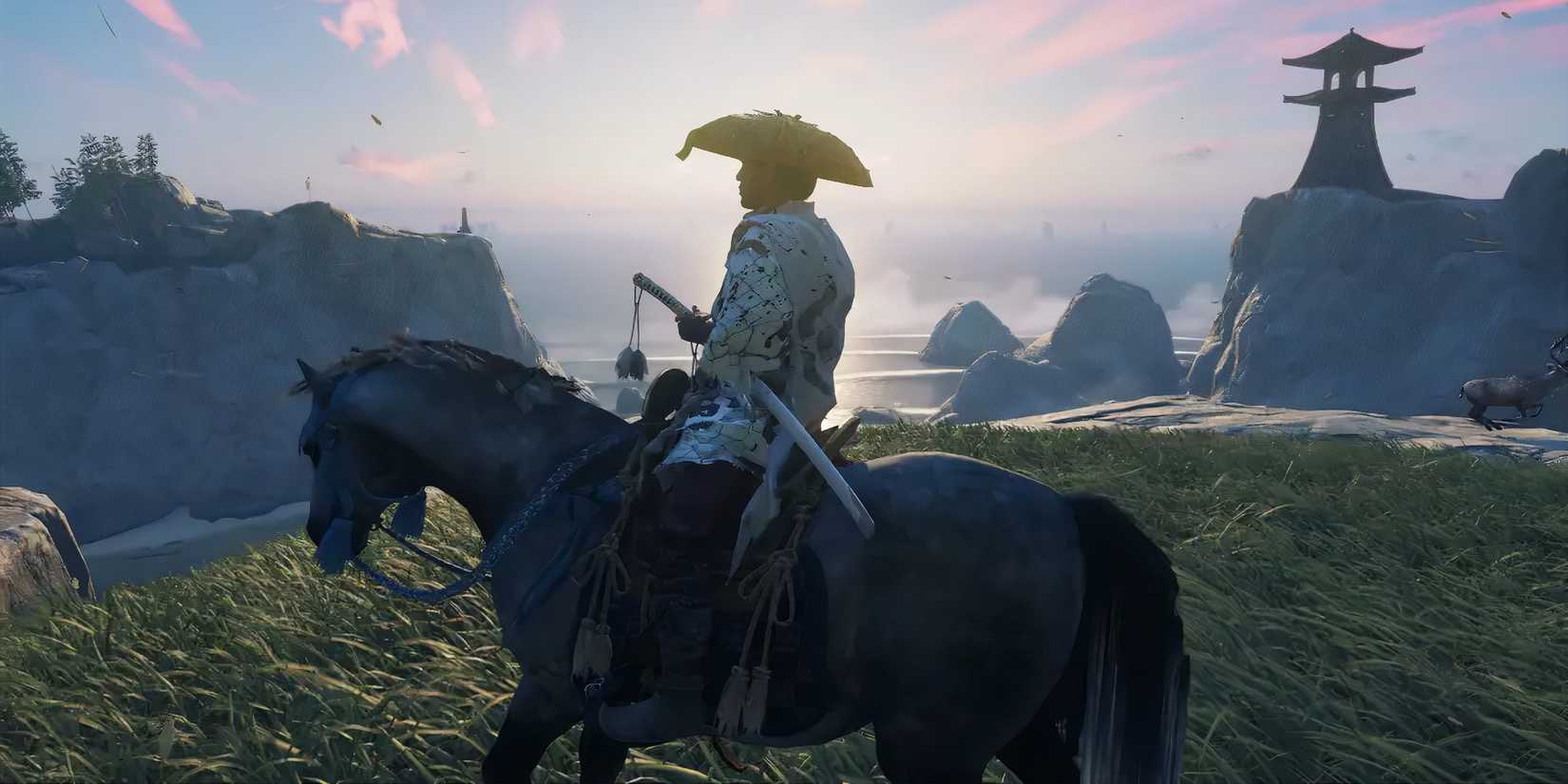 Jin Sakai sitting on his horse in front of the sunrise in Ghost of Tsushima