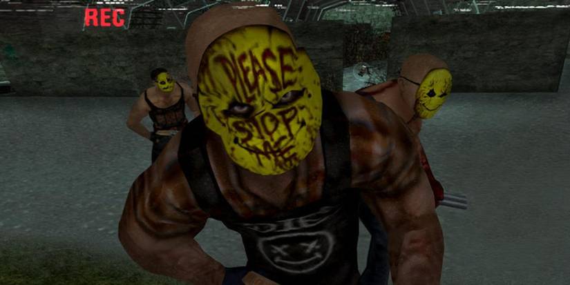A large man with a yellow mask reading 'please stop me' written on it in blood