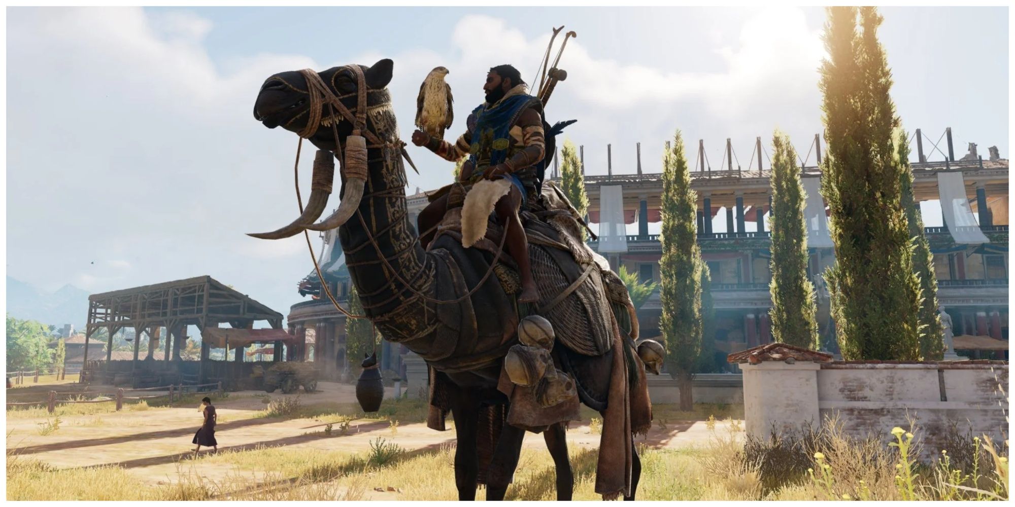 Assassin's creed origins bayek on a camel in front of a building