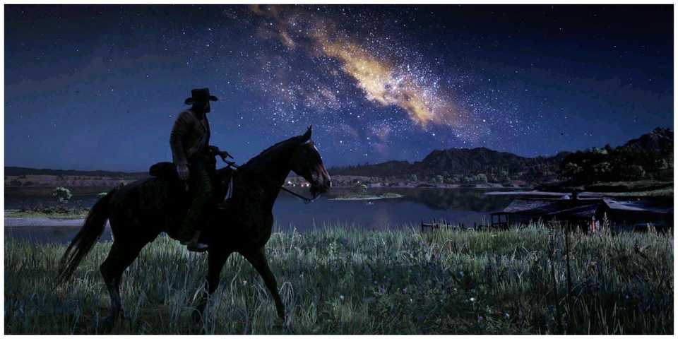 Red Dead Redemption 2 main character on horseback watching the night sky full of stars