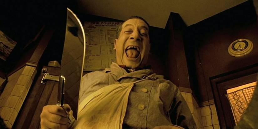 Man with big knife is happy