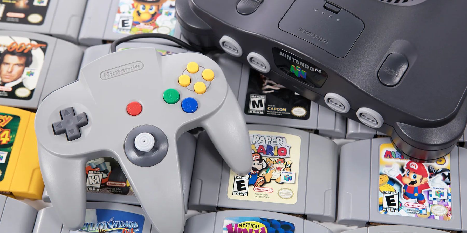 An image of a Nintendo 64 console, controller, and several game cartridges.