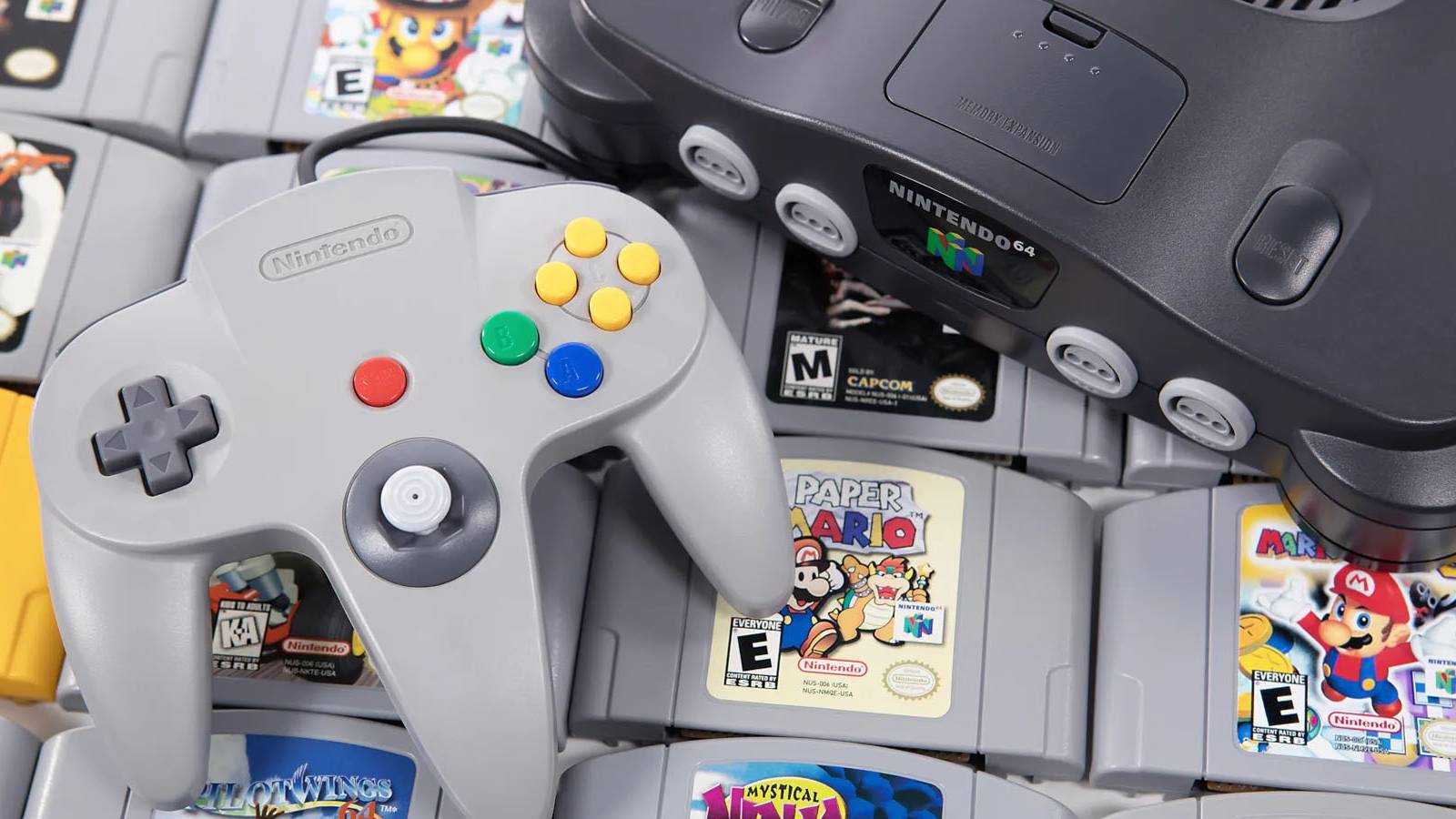 An image of a Nintendo 64 console, controller, and several game cartridges.