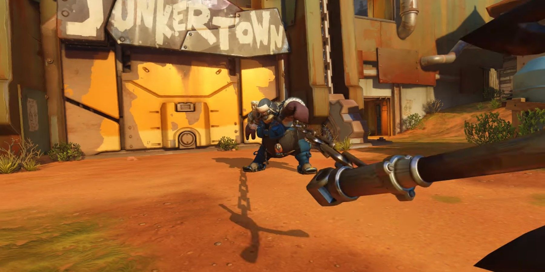 the ice fisher roadhog skin from OW2 hooking the camera on junkertown