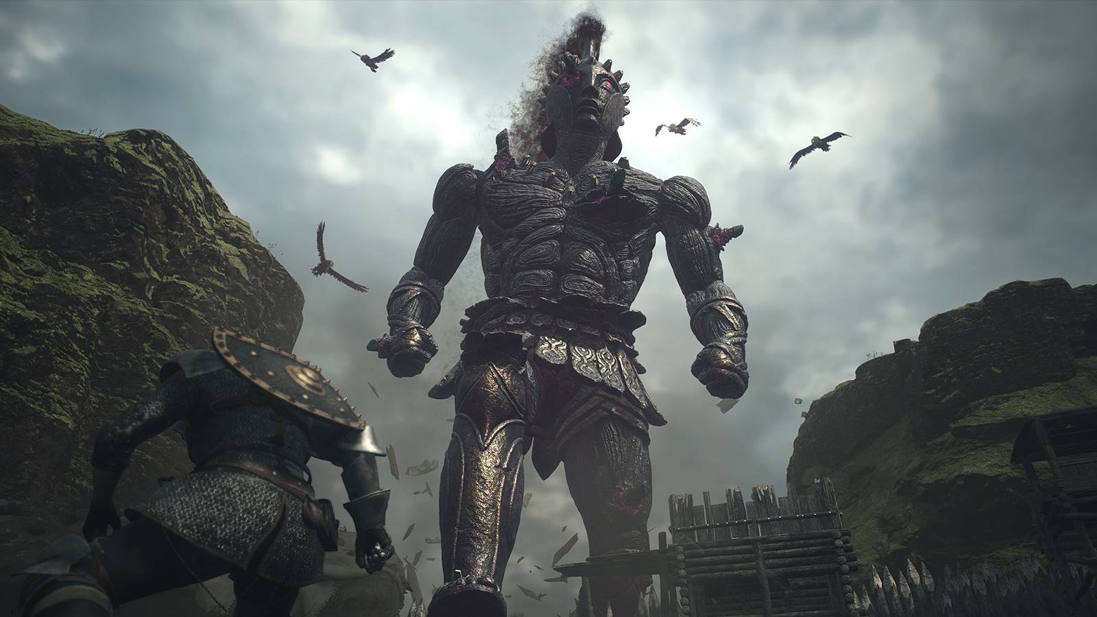 Player standing below Gigantus Talos in Dragon's Dogma 2