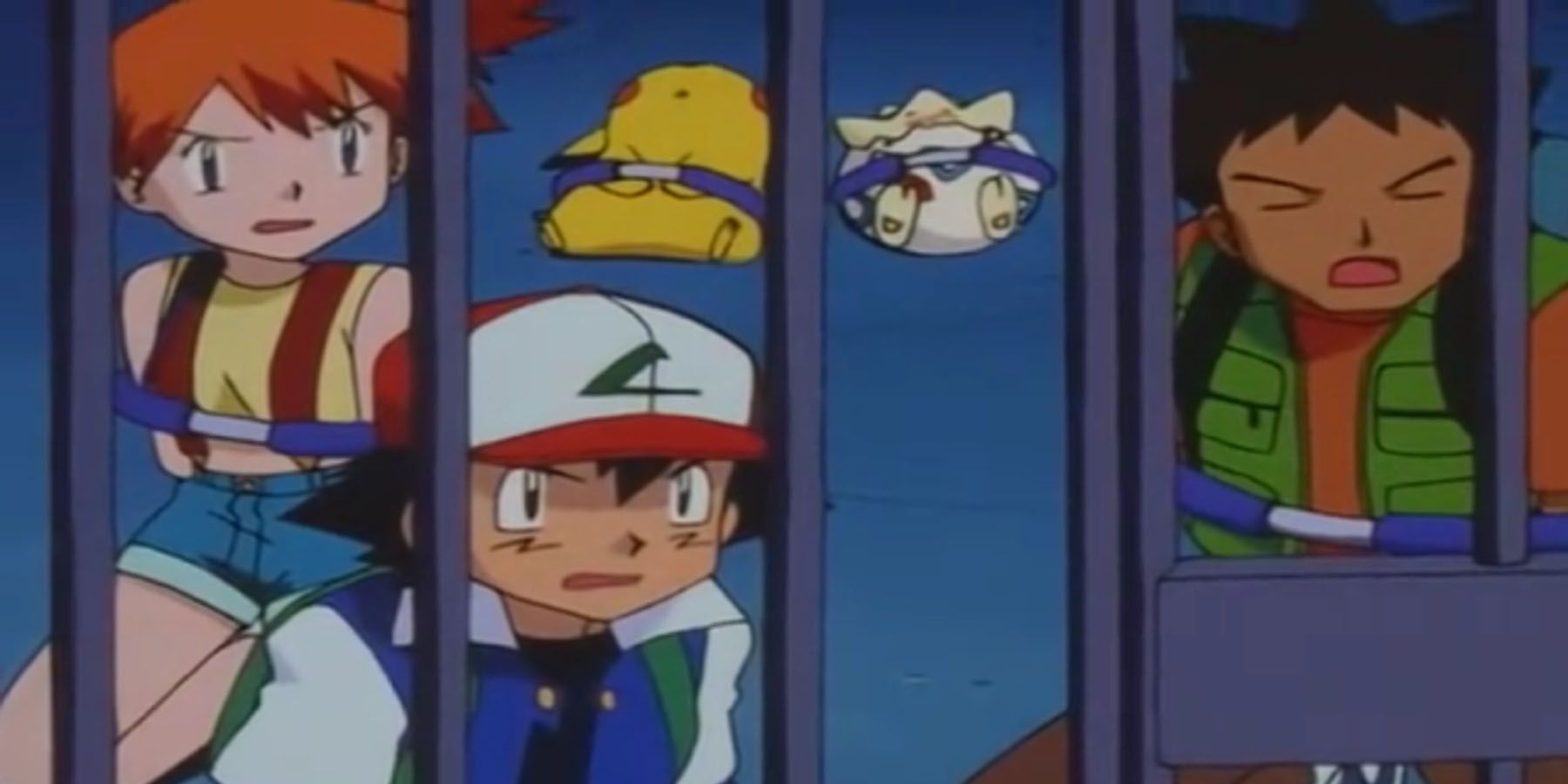 A screenshot of Ash and his friends being locked in prison in the Pokemon anime.