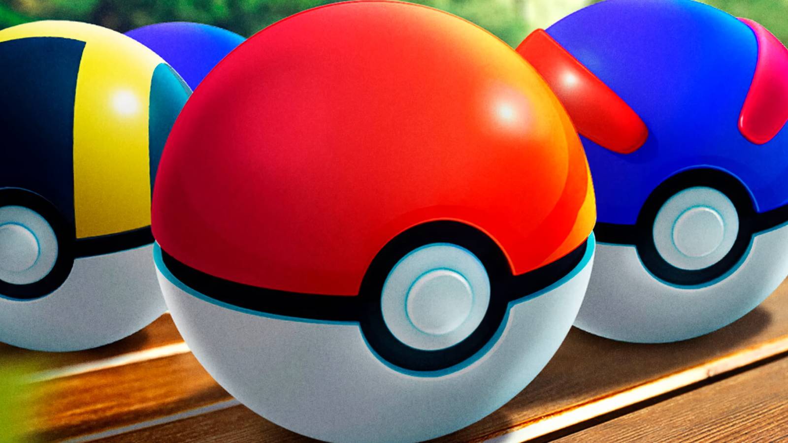 A promotional visual from Pokemon GO showing a Poke Ball, Great Ball, and Ultra Ball.