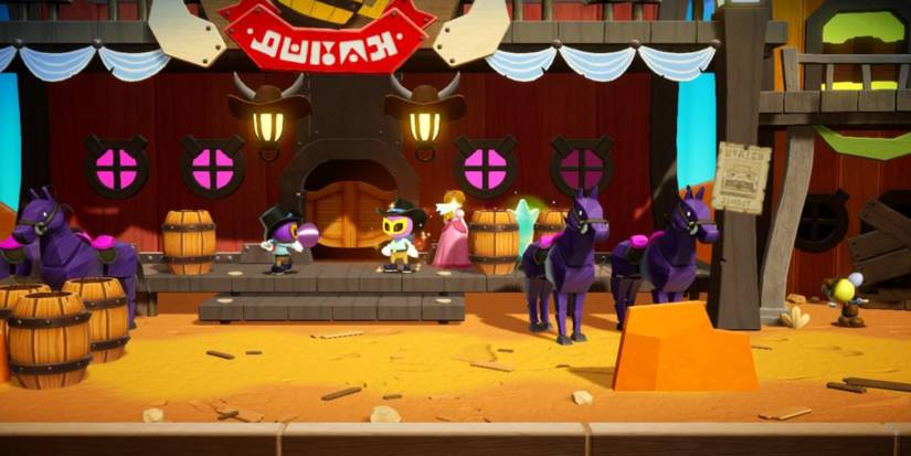 grabbing sparkle gem in front of saloon