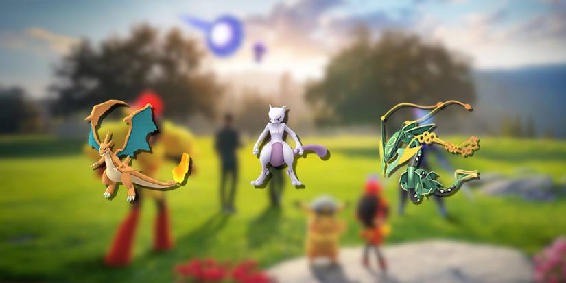 Image of Charizard Y, Mewtwo, and Mega Rayquaza in the foreground from Pokemon GO