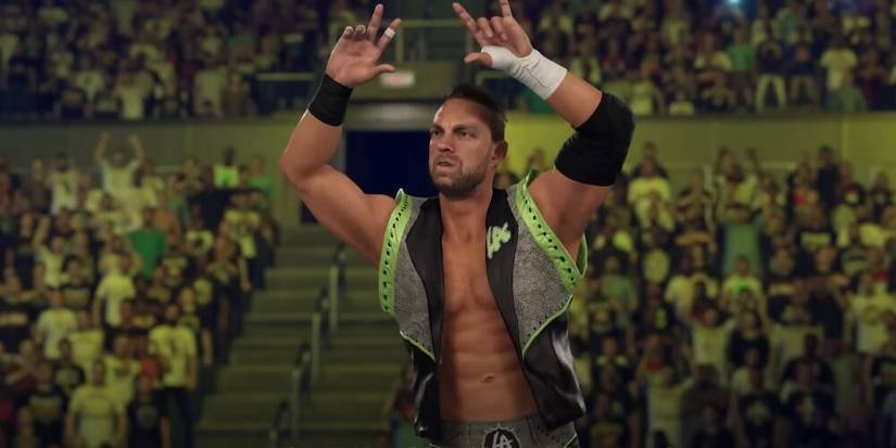 LA Knight throwing up his sign 